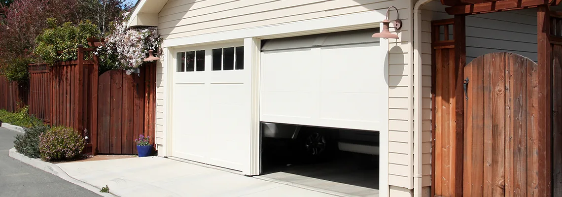 Fix Metal Garage Door Jerking in Elgin, Illinois